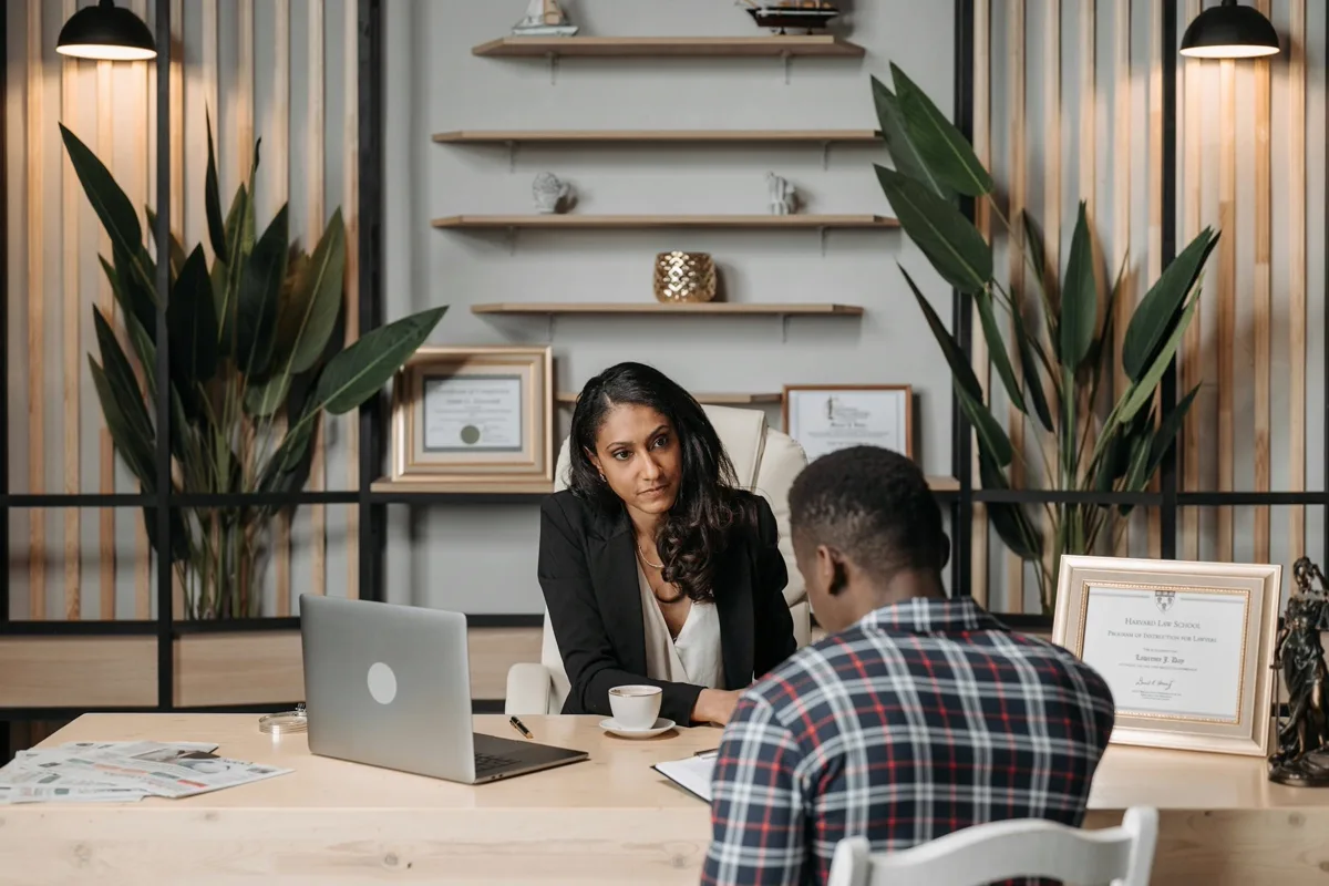 Debt counsellor consultation in modern South African office
